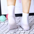 White crew socks with grey reinforced heel and sole featuring copper fiber technology - One Size / Mid-Calf White