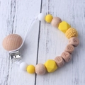 Baby pacifier clip with beech wood, yellow silicone beads and 'BABY' engraved wood block - Yellow