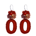 Detail of handmade bohemian woven flower earrings with red beads and silver metal hooks - Red