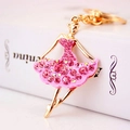 Elegant gold ballerina keychain with pink rhinestones and ballet tutu for bags - Pink