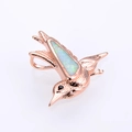 Rose gold hummingbird pendant with opal wings and black stone eye inlay on white background - Rose Gold White Opal