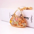 Chic gold-toned handbag keychain with colorful cat-eye stones and crystal rhinestones - Length 12CM Height 6CM Width 5CM / Gold