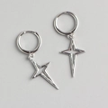 Detailed view of silver S925 sterling silver hoop earrings with hollow star charms - 925 Silver / Silver