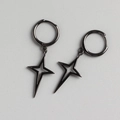 Detailed macro view of black minimalist S925 silver star hoop earrings for women - 925 Silver / Black