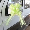 Close-up of light green macaron pull bow ribbon decorating a white car mirror - 10 Strands Pack / Pastel Light Green