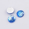 Macro detail of 10mm blue mermaid fish scale resin cabochons with flat silver backing - Iridescent Royal Blue(7)
