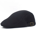 Close-up of black mesh fabric and bronze adjustable buckle on the breathable summer cap - Black