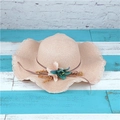 Pink wide-brim straw hat with decorative flower and bow on blue striped wood - Adult M / Light Pink