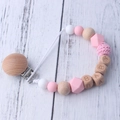 Pink and white silicone bead pacifier clip with beech wood accents and BABY letter beads - Pink