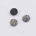 Detailed view of 10mm flatback resin cabochons showing textured silver glitter and smooth back - Silver Black (6)