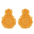 Detail of bohemian orange seed bead earrings with handmade woven circular design - Yellow