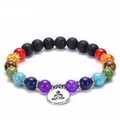 Chakra beaded bracelet featuring black lava stones and silver Buddha pendant charm - Buddha Pendant