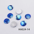 Detailed macro view of 16mm round AB colorful resin fish scale cabochons for DIY - Emerald Green Holographic (HA024-14)