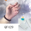 Détail des stickers ongles QF429 avec sourires noirs et cœurs bleus sur base transparente - Style Lignes Cœur Sourire Minimaliste (QF429)