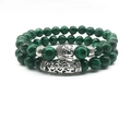 Detail of beaded bracelet set with silver Buddha head and engraved metal tube decor - Black Malachite Style