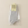 Calcetines invisibles de algodón gris claro en embalaje con tarjeta de producto - Talla única / Gris