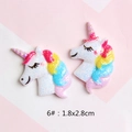 Close-up of glittery resin unicorn charm with rainbow mane for DIY accessories 1.8x2.8cm - Size 6