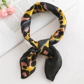 Elegant satin square scarf with colorful leopard print tied in a knot on a white texture - 50*50CM / FX-58 Leopard Striped Yellow