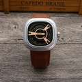 Close-up of punk style square watch with silver case and rotating dial on leather strap - Silver Case Coffee Strap
