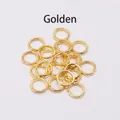 Detailopname van gouden buigringen voor DIY sieraden maken op witte achtergrond - 0.7*5mm (200 stks/pak) / Goud
