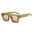Detail view of translucent yellow-green thick frame square sunglasses with light brown lenses - Olive Green Frame Champagne Lens