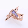 Detail of rose gold hummingbird pendant with opal inlay and delicate feather textures - Rose Gold Pink Opal