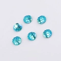 Macro detail of 8mm blue fish scale resin flatback cabochons with AB rainbow finish - 8mm / Blue (No.13)