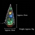 Detail view of a 25cm mini cedar Christmas tree with LED lights and wooden base - Colored Light Style / 25cm
