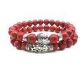 Two-piece red stone bead bracelet set with silver Buddha head and floral tube charms - Red Howlite