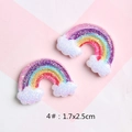 Macro detail of glittery resin rainbow cloud charms for DIY hair clips and shoes - 4#