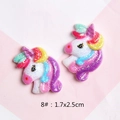 Macro shot of colorful glitter resin unicorn charms for DIY hair clips and shoes, 1.7x2.5cm - Size 8