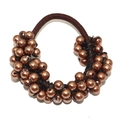 Brown braided hair ring featuring polished pearl beads and elastic band on white background - Coffee