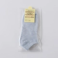 Light blue low cut invisible cotton blend socks in flat-lay retail packaging - One Size / Blue