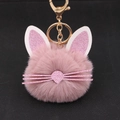 Detail of pink faux fur cat keychain with glittery ears and gold metal clasp - Dust Rose