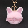 Close-up of pink plush bunny keychain with glittery ears and gold metal ring - Light Pink