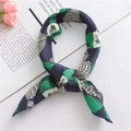 Elegant navy blue silk scarf with green scale patterns tied in a chic bow on a book - 50*50CM / FX-54 Green Hair Witch