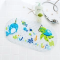 Transparent oval PVC bath mat with blue narwhal and sea turtle pattern for kids - Big Fish