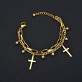 Close-up of gold double-layer chain bracelet featuring cross charms and polished beads - Double Layer Cross Gold