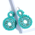 Handmade turquoise beaded bohemian double circle earrings with iridescent accents - Green