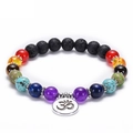 Lava stone chakra bracelet featuring colorful natural beads and a silver Om symbol charm - Om Pendant