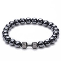 Hematite beaded bracelet featuring a metal dumbbell charm engraved with LIVE and LIFT - Hematite