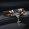 Close-up of men's leather cross bracelet with brown beads and silver charms - Cross Wood Beads Style / Dark Brown