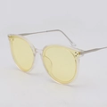 Modern transparent cat-eye sunglasses with bright yellow lenses and slim silver metal temples - Clear Frame Yellow Lens