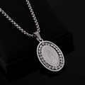 Macro view of silver oval pendant featuring Guadalupe portrait and crystal rhinestones - Silver Single Row Claw Stone Pendant (No Chain) / Silver