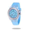 Detailed close-up of light blue quartz watch with rhinestone bezel and silicone strap - Light Blue