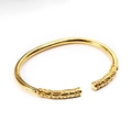 Vintage golden stainless steel open bangle bracelet with ornate auspicious cloud carving - Gold
