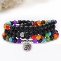 7 Chakra armband van matzwarte stenen met zilveren Om-hanger en lotusbloem - OM Symbool Stijl - 108 Matte Steen