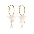 Elegant gold hoop earrings with white frosted flower petals and clear crystal teardrops - Floral Tassel Large Hoop Style (A2333)