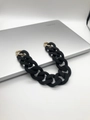 Close-up of black acrylic handbag chain strap with gold metal lobster clasps - 30cm / Black