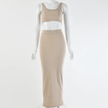 Detailed view of beige ribbed knit crop top and high waist maxi skirt set on a mannequin - S / Apricot
